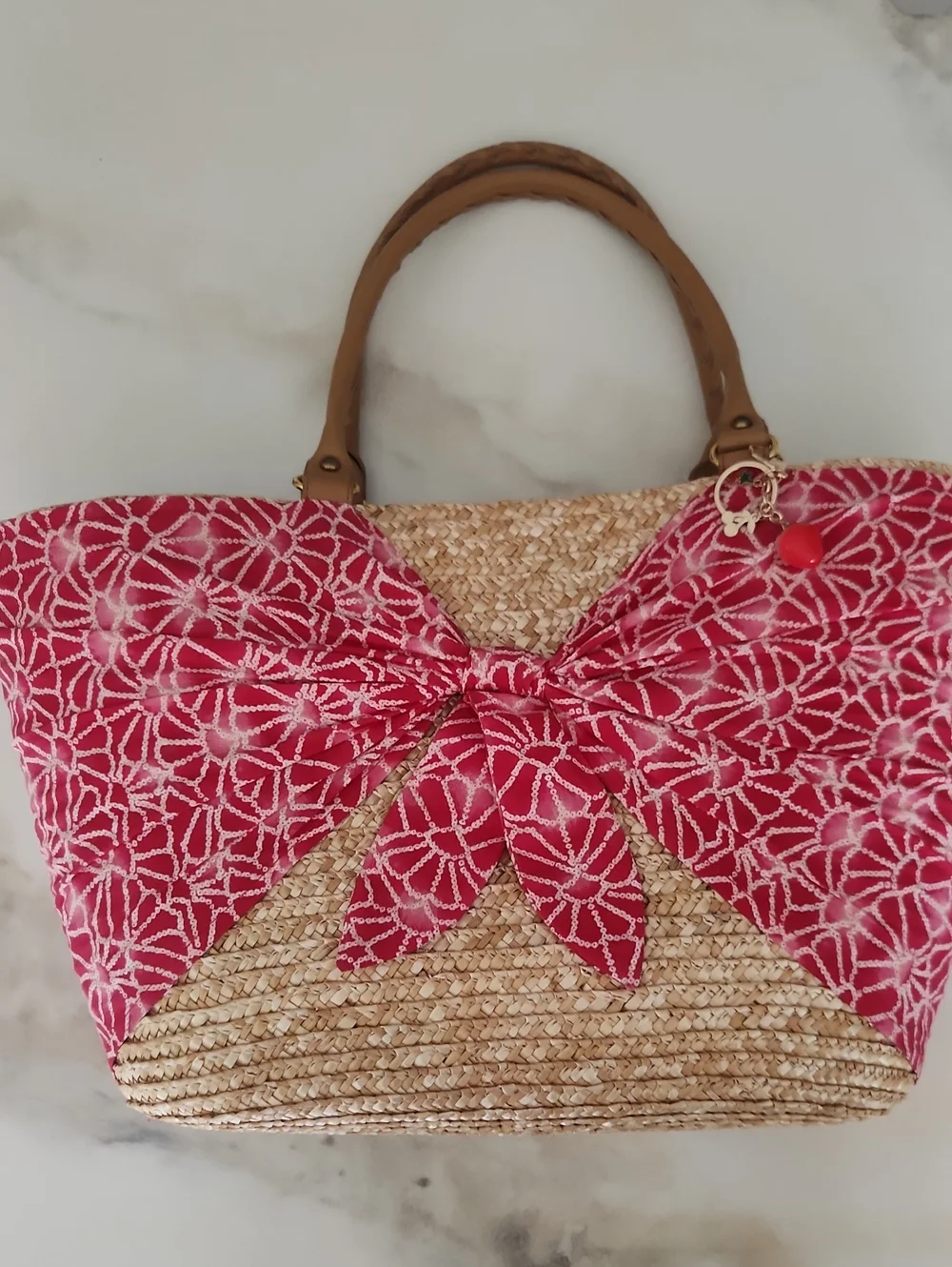 Calypso St. Barth Straw Tote with Pink Patterned Bow and Tan Handles